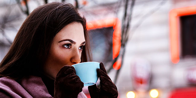 Woman Sipping Coffee