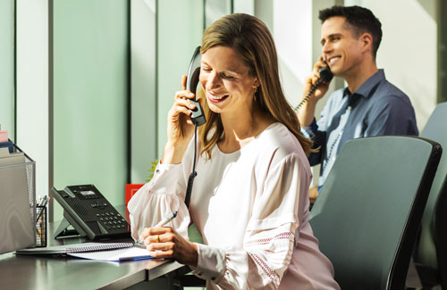 Woman Talking on Polycom VVX 150